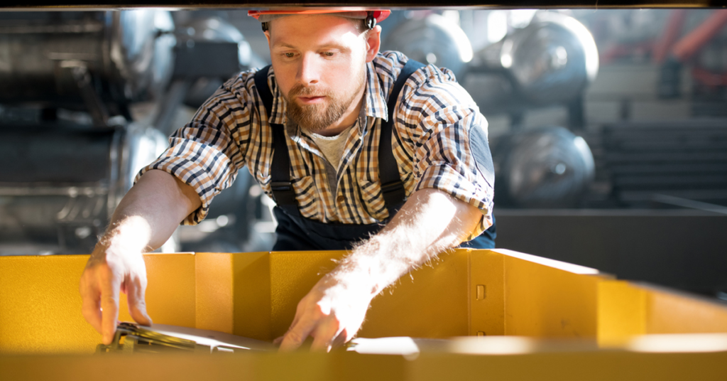 factory worker assembling parts