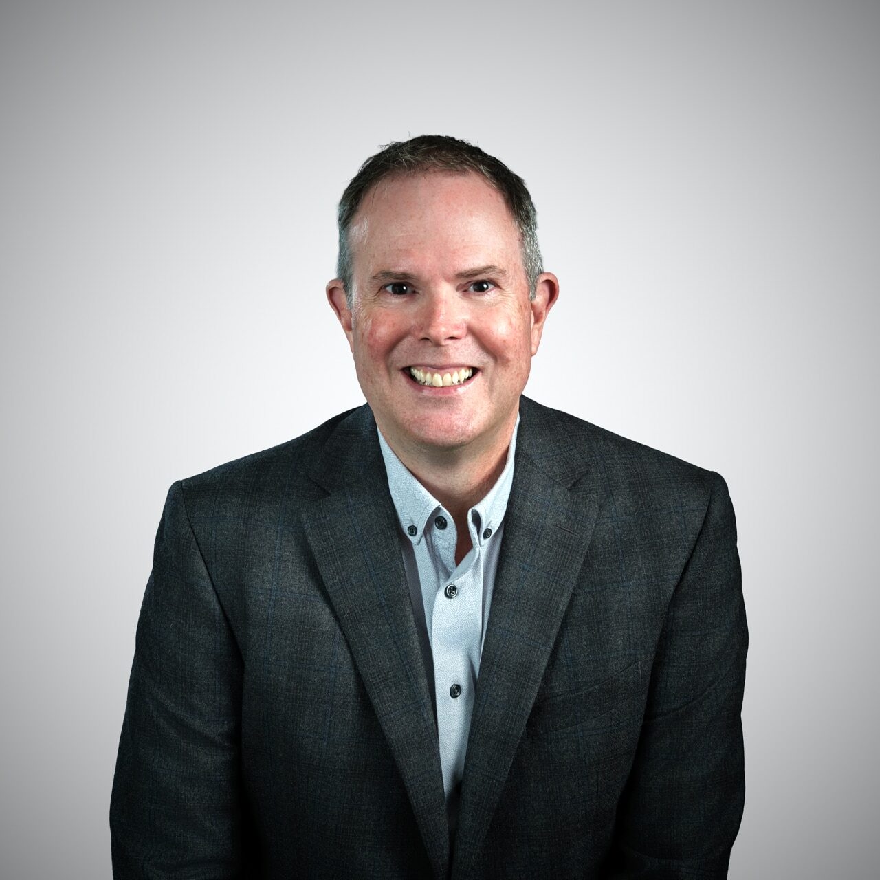 Greg standing w Jacket 2 - Web Use - 2025-07-31