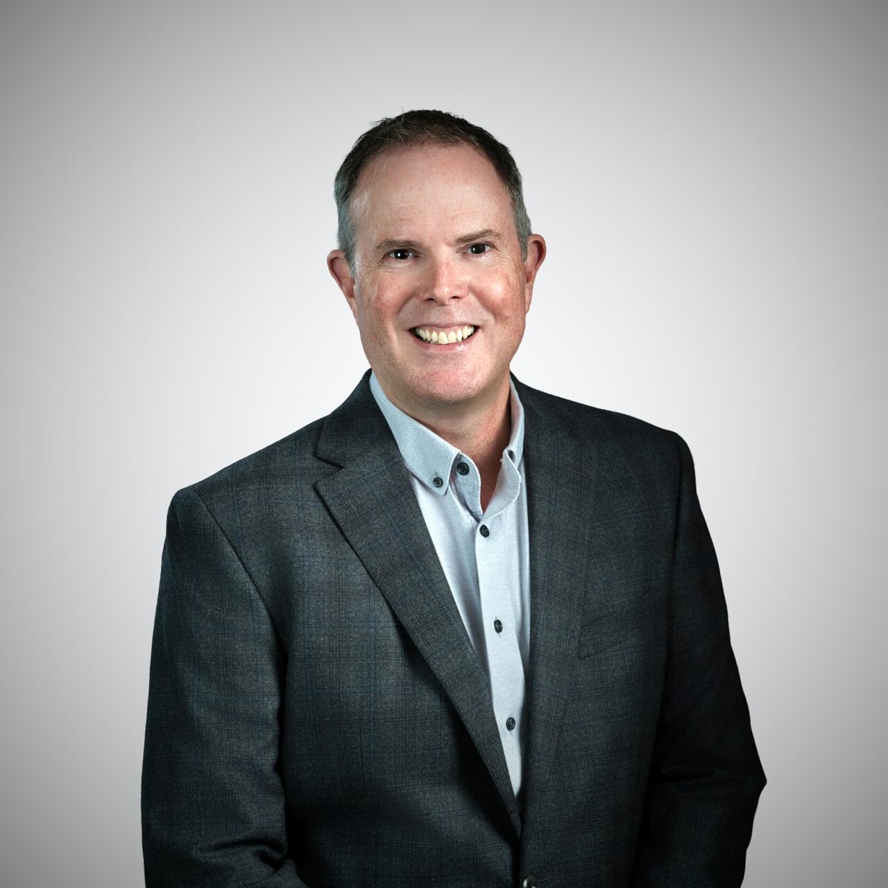 Greg standing w Jacket - Web Use - 2025-07-31
